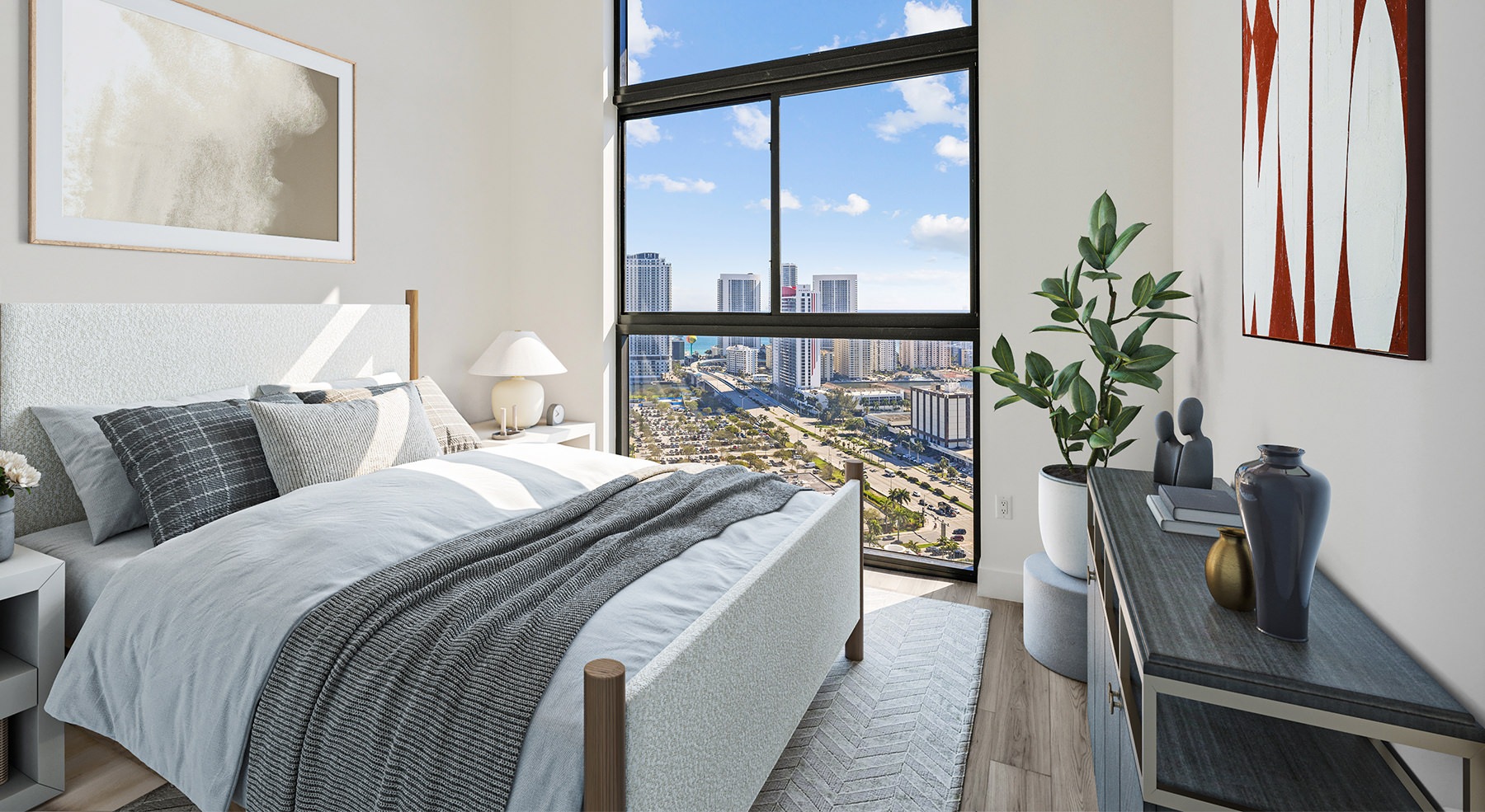 room with a bed and large window