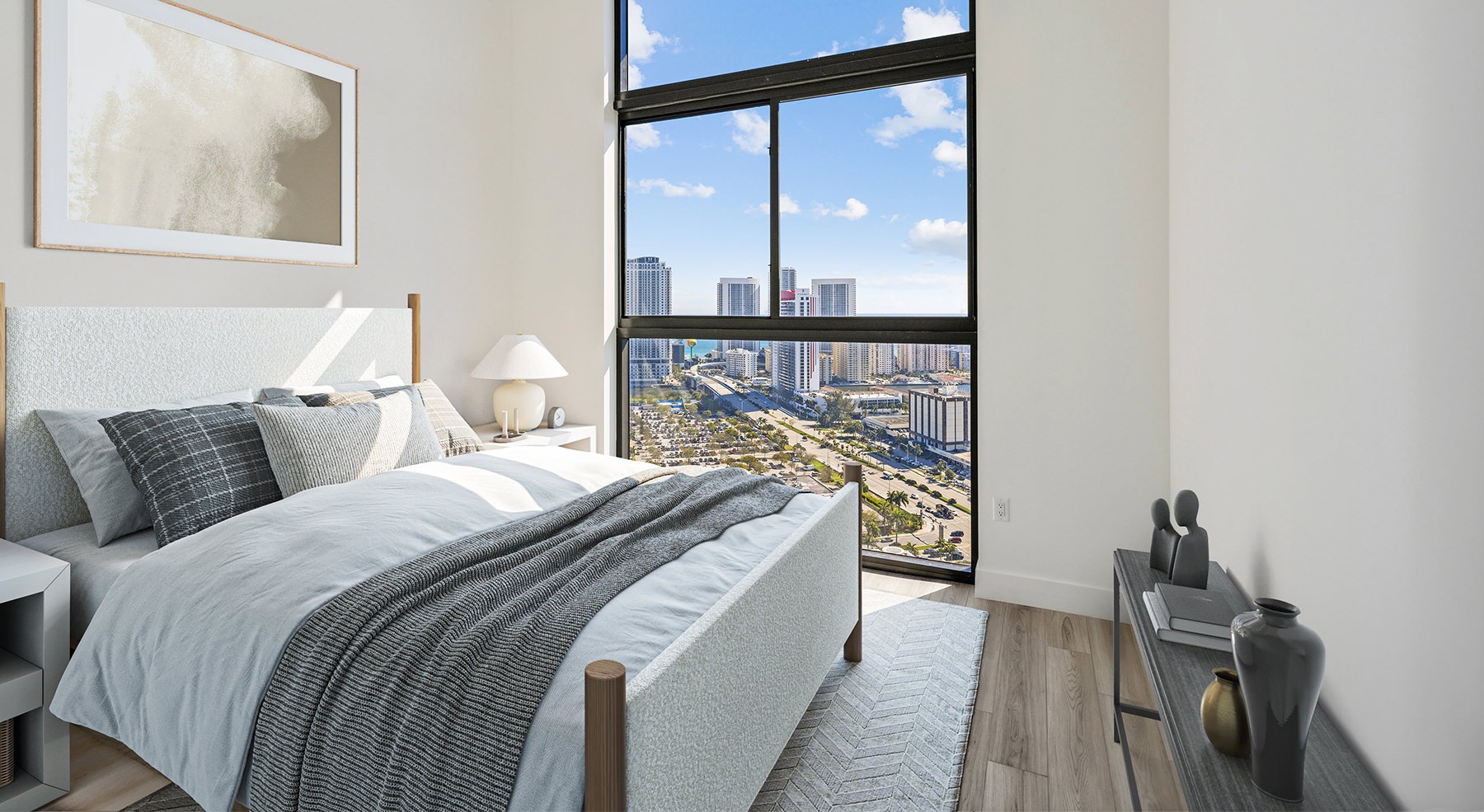 room with a bed and a large window